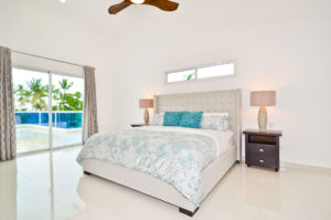 large bedroom with balcony in penthouse condo at The SANCTUARY at Los Corales