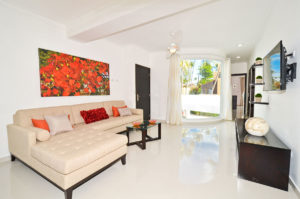 living room with large window in second floor condo at The SANCTUARY at Los Corales