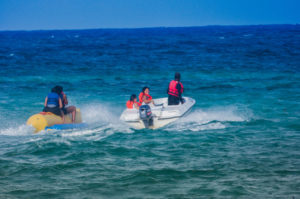 people on a banana boat ride