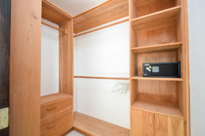 built in closet with safe in a penthouse condo at The SANCTUARY at Los Corales